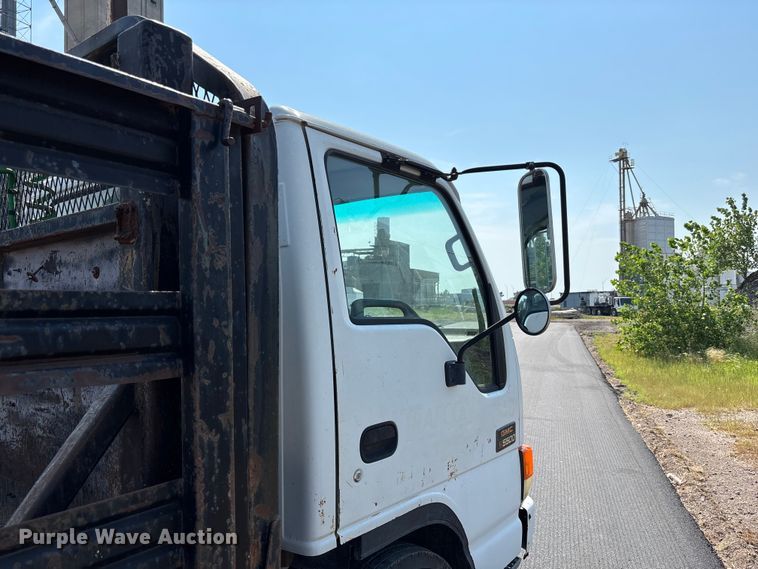 image for item FP3009 2004 GMC W5500 flatbed truck