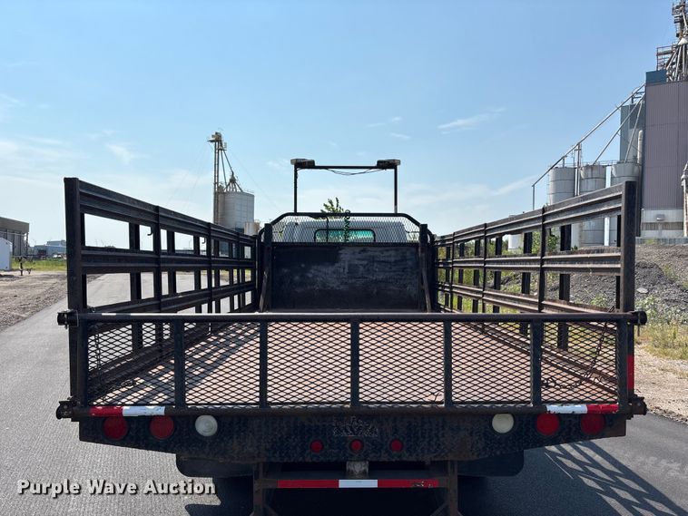 image for item FP3009 2004 GMC W5500 flatbed truck
