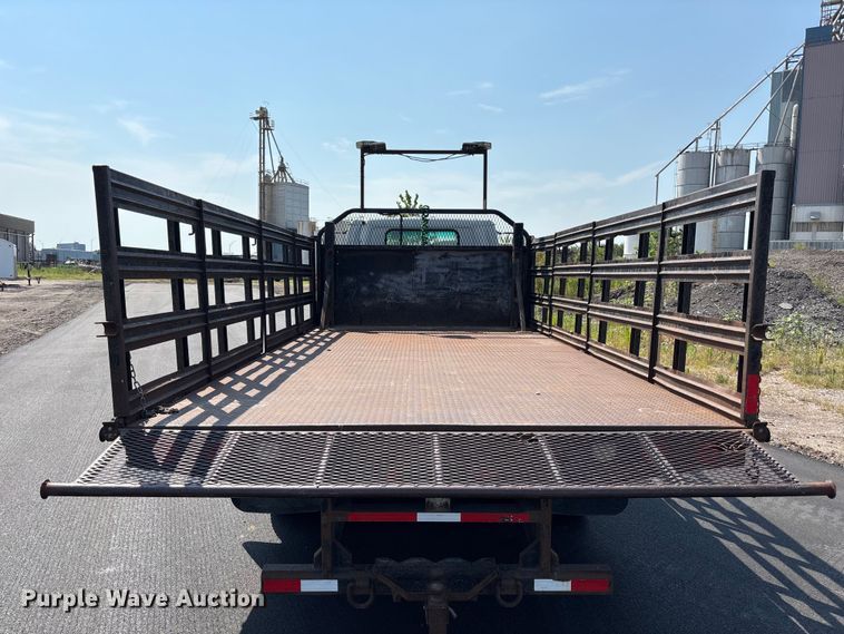 image for item FP3009 2004 GMC W5500 flatbed truck