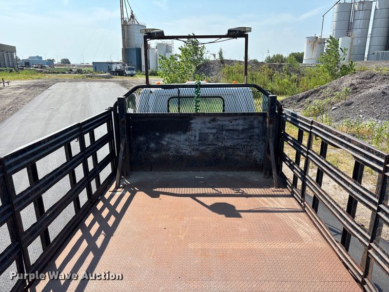 image for item FP3009 2004 GMC W5500 flatbed truck