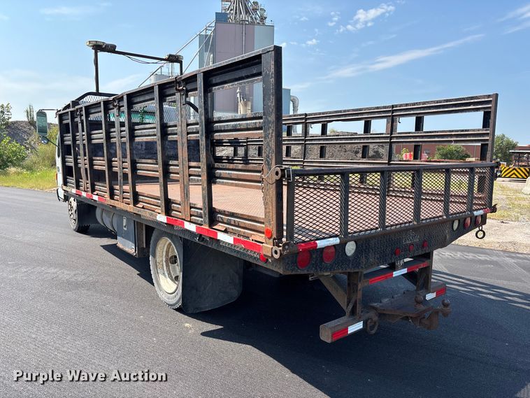image for item FP3009 2004 GMC W5500 flatbed truck