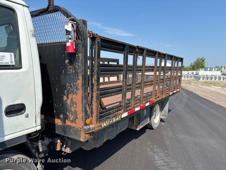 image for item FP3009 2004 GMC W5500 flatbed truck