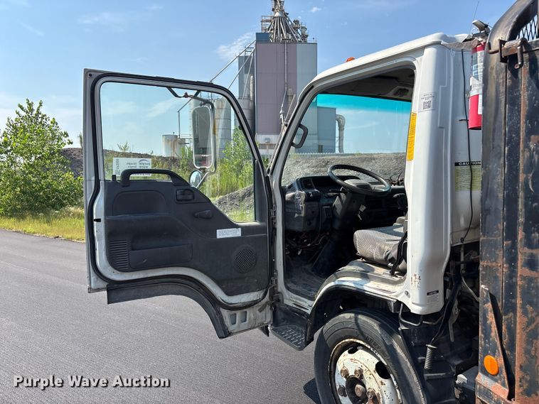 image for item FP3009 2004 GMC W5500 flatbed truck