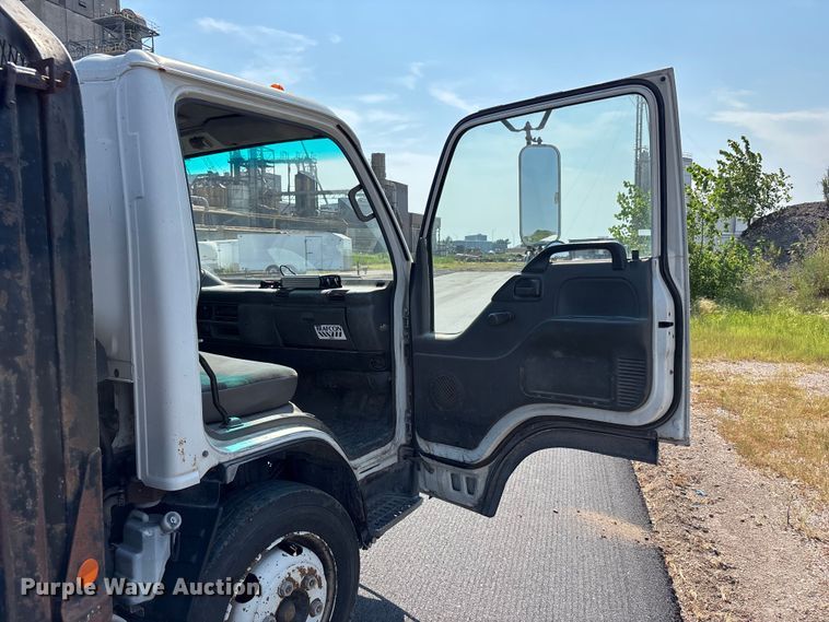 image for item FP3009 2004 GMC W5500 flatbed truck