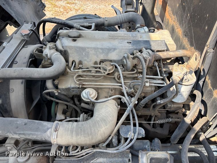 image for item FP3009 2004 GMC W5500 flatbed truck