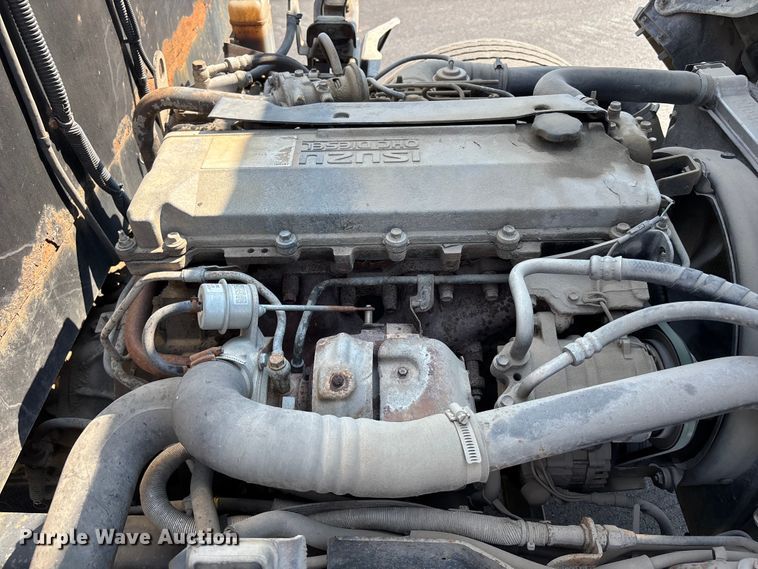 image for item FP3009 2004 GMC W5500 flatbed truck