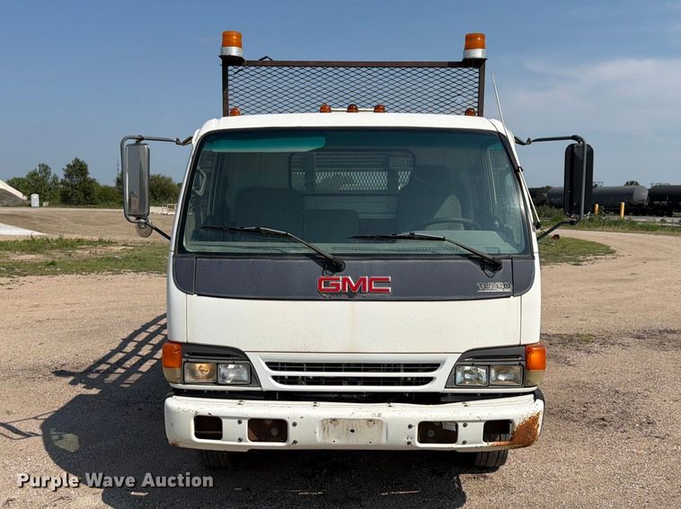 image for item FP3010 2002 GMC W5500 flatbed truck