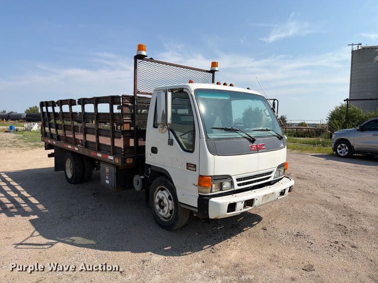 image for item FP3010 2002 GMC W5500 flatbed truck