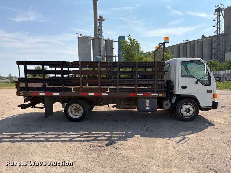 image for item FP3010 2002 GMC W5500 flatbed truck