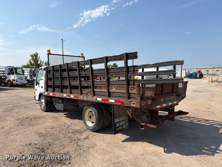 image for item FP3010 2002 GMC W5500 flatbed truck