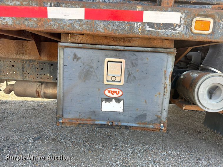 image for item FP3010 2002 GMC W5500 flatbed truck