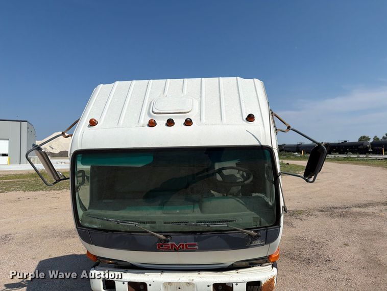 image for item FP3010 2002 GMC W5500 flatbed truck