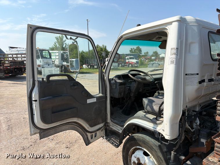image for item FP3010 2002 GMC W5500 flatbed truck