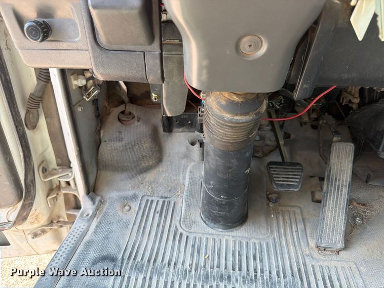 image for item FP3010 2002 GMC W5500 flatbed truck