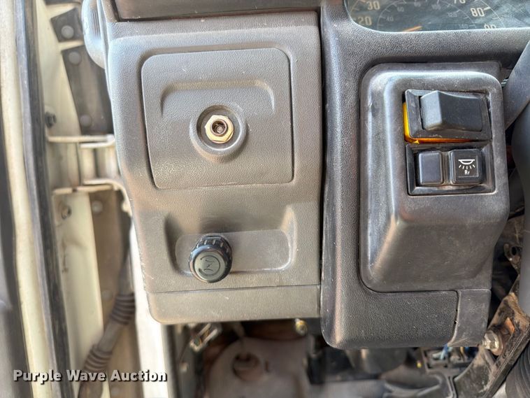 image for item FP3010 2002 GMC W5500 flatbed truck
