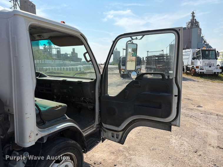 image for item FP3010 2002 GMC W5500 flatbed truck