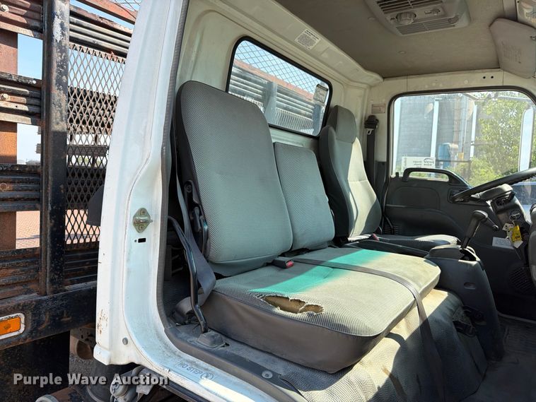 image for item FP3010 2002 GMC W5500 flatbed truck
