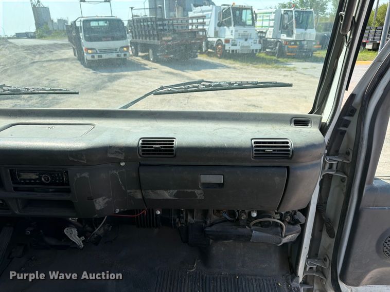 image for item FP3010 2002 GMC W5500 flatbed truck