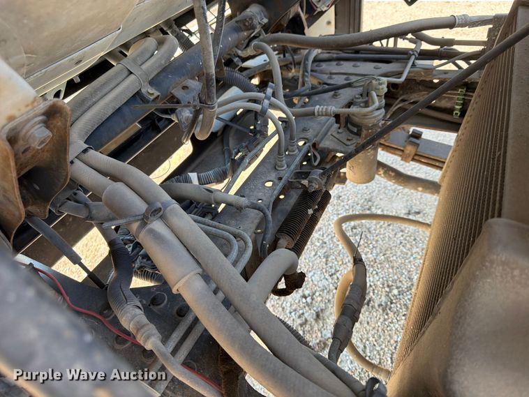 image for item FP3010 2002 GMC W5500 flatbed truck