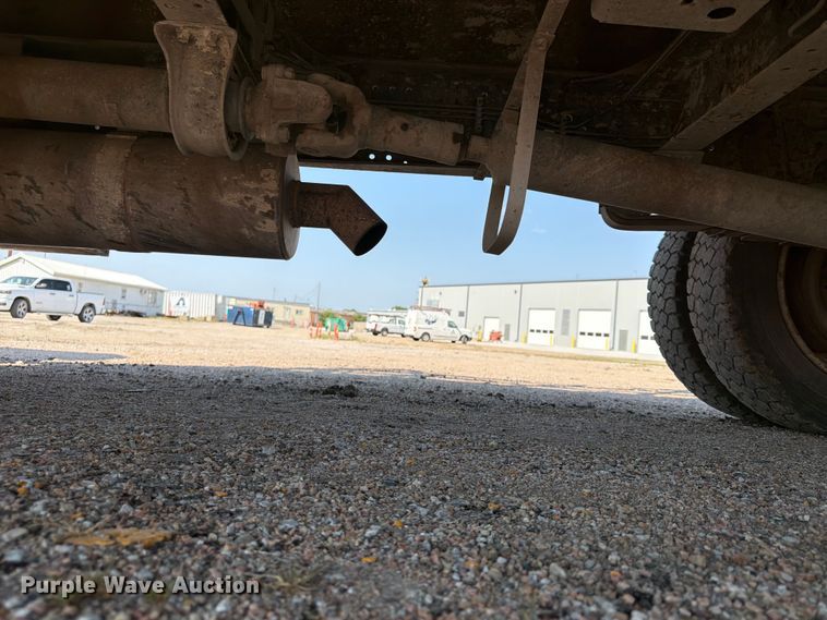 image for item FP3010 2002 GMC W5500 flatbed truck