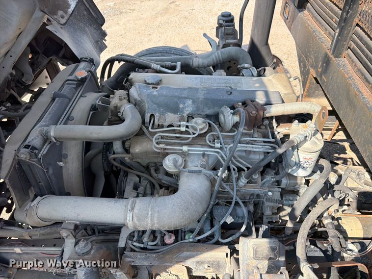 image for item FP3010 2002 GMC W5500 flatbed truck
