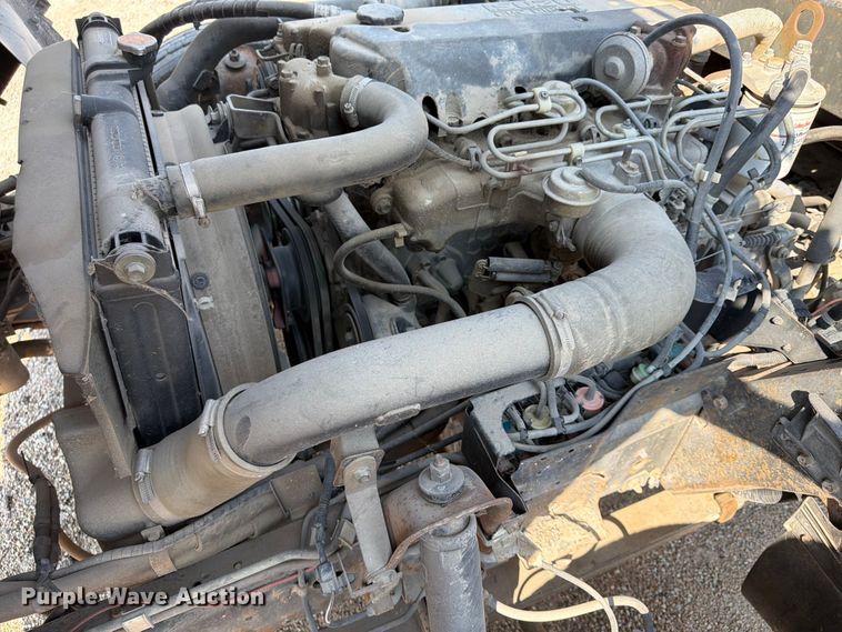 image for item FP3010 2002 GMC W5500 flatbed truck