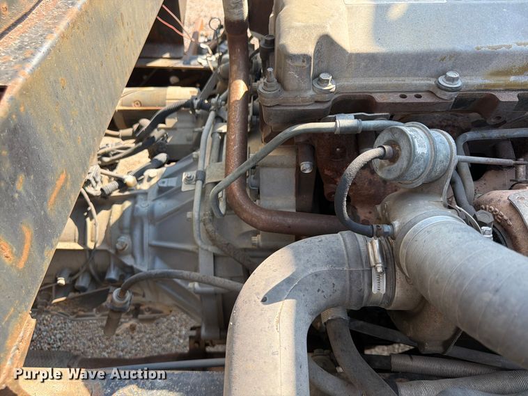 image for item FP3010 2002 GMC W5500 flatbed truck