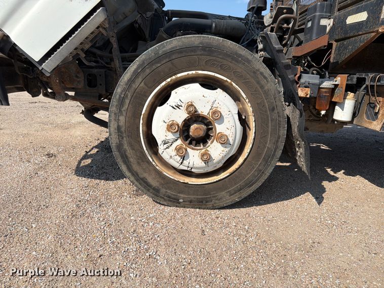 image for item FP3010 2002 GMC W5500 flatbed truck