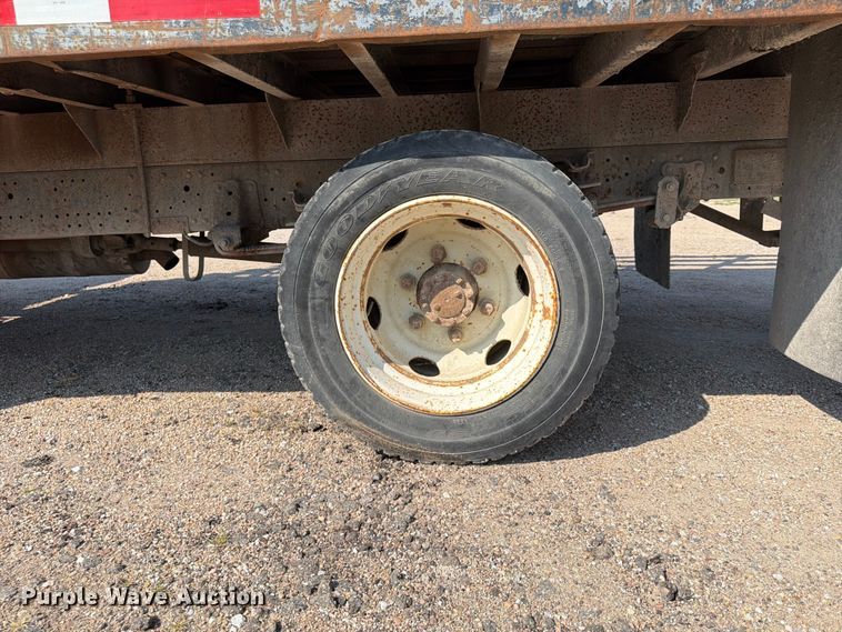 image for item FP3010 2002 GMC W5500 flatbed truck