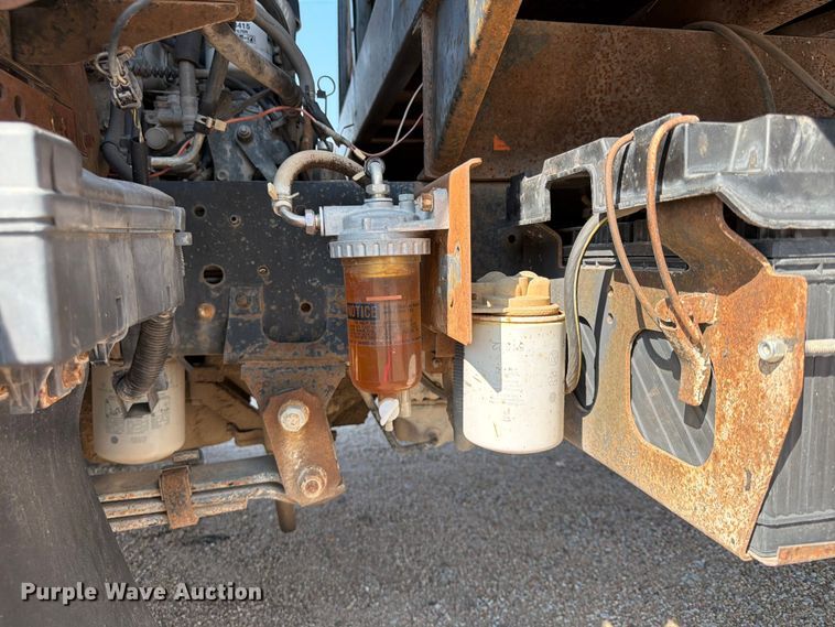 image for item FP3010 2002 GMC W5500 flatbed truck
