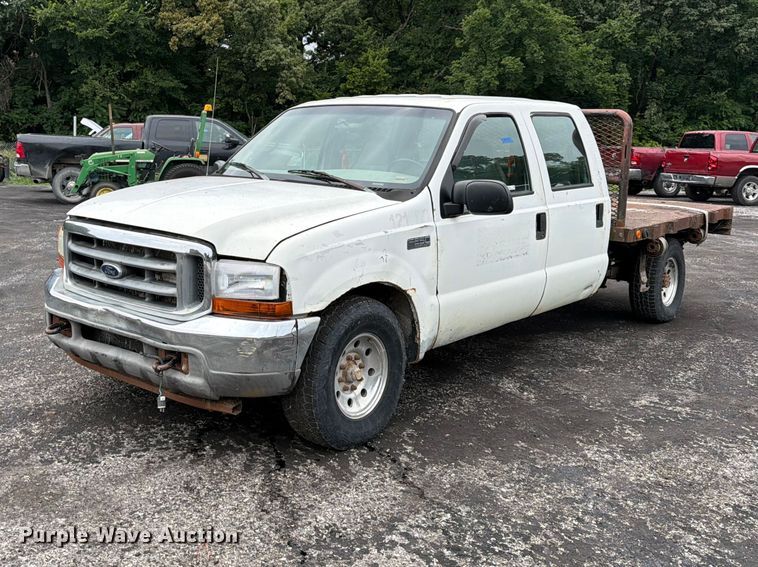 2001 Ford F250 Super Duty Crew Cab flatbed pickup truck