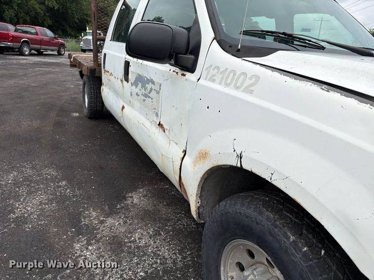 image for item FU4536 2001 Ford F250 Super Duty Crew Cab flatbed pickup truck