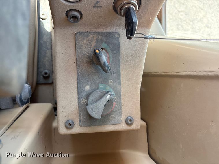 image for item JM9477 1999 Caterpillar 140H motor grader