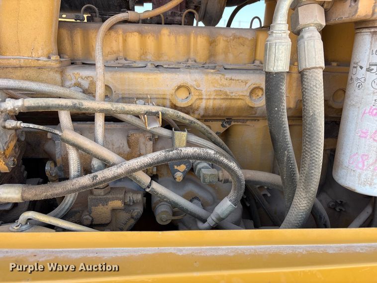 image for item JM9477 1999 Caterpillar 140H motor grader