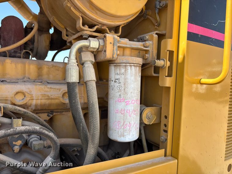 image for item JM9477 1999 Caterpillar 140H motor grader