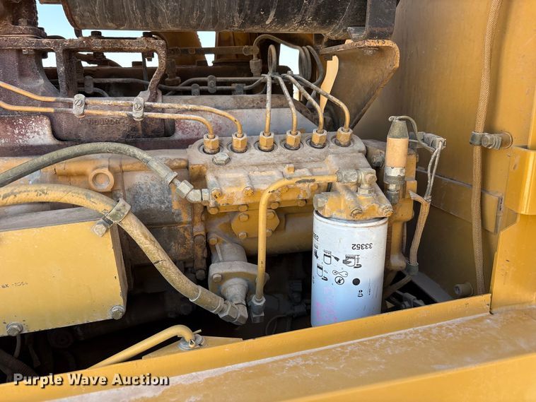 image for item JM9477 1999 Caterpillar 140H motor grader