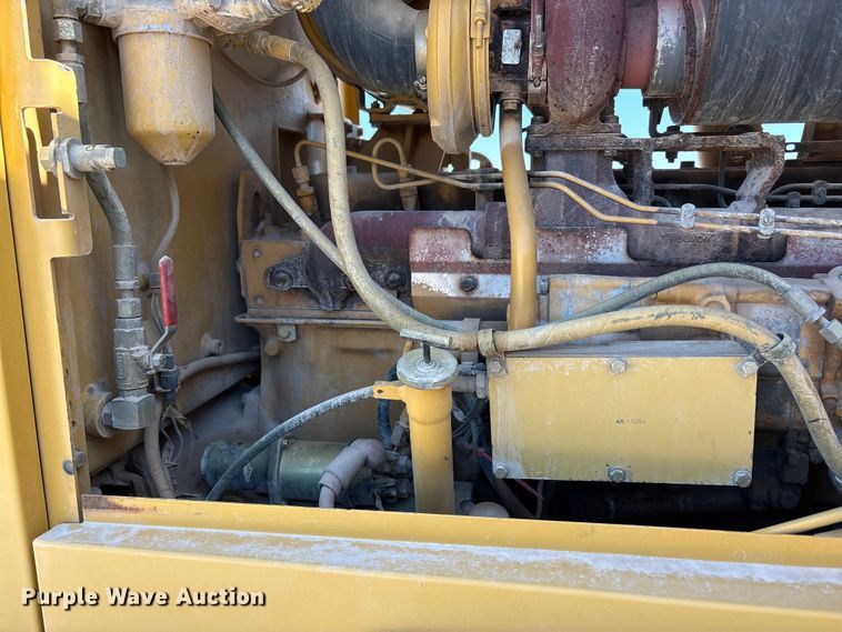 image for item JM9477 1999 Caterpillar 140H motor grader