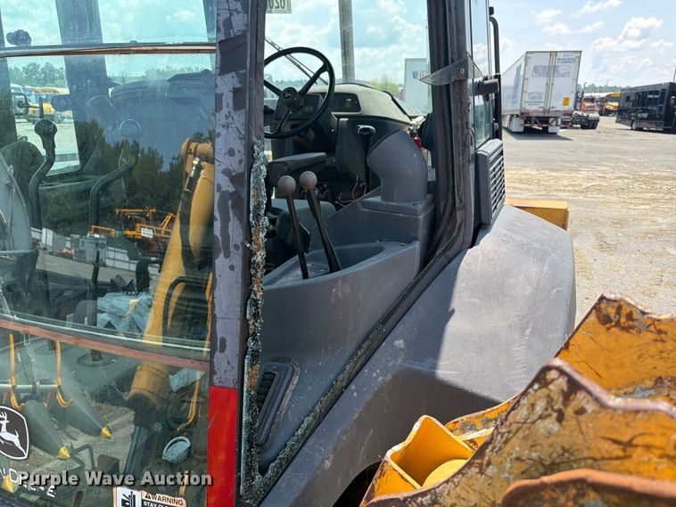 image for item YA4483 2006 John Deere 310SG backhoe