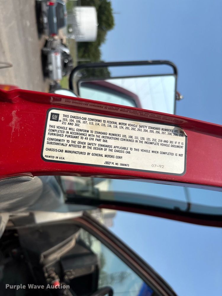 image for item DZ4524 1992 GMC C7 TopKick hook lift truck