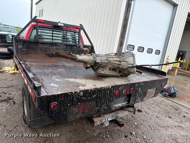 image for item EV2351 2004 Ford F350 Super Duty XL Ext. Cab flatbed pickup truck