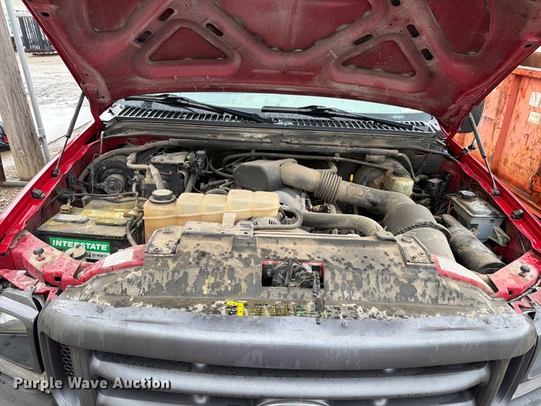 image for item EV2351 2004 Ford F350 Super Duty XL Ext. Cab flatbed pickup truck