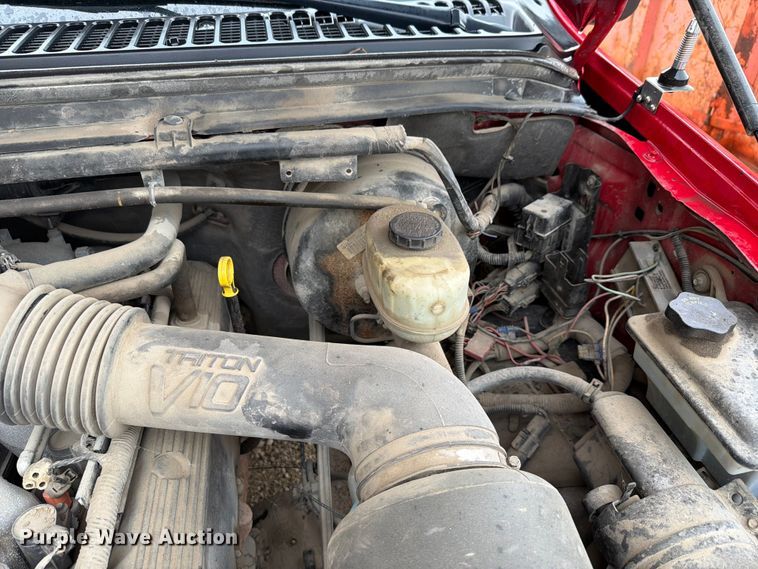 image for item EV2351 2004 Ford F350 Super Duty XL Ext. Cab flatbed pickup truck