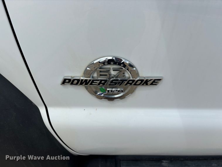 image for item FG0562 2016 Ford F450 Super Duty Crew Cab flatbed truck