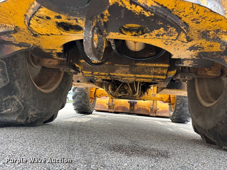 image for item FG0567 2003 John Deere 410G backhoe