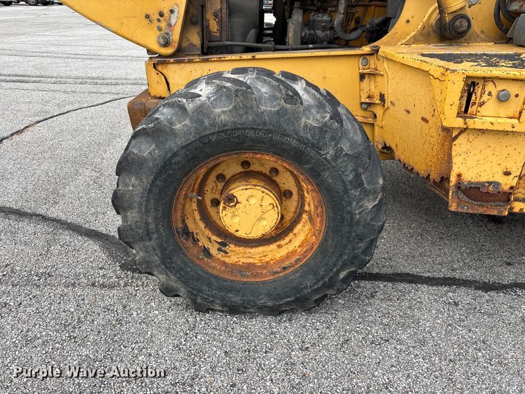 image for item FG0567 2003 John Deere 410G backhoe