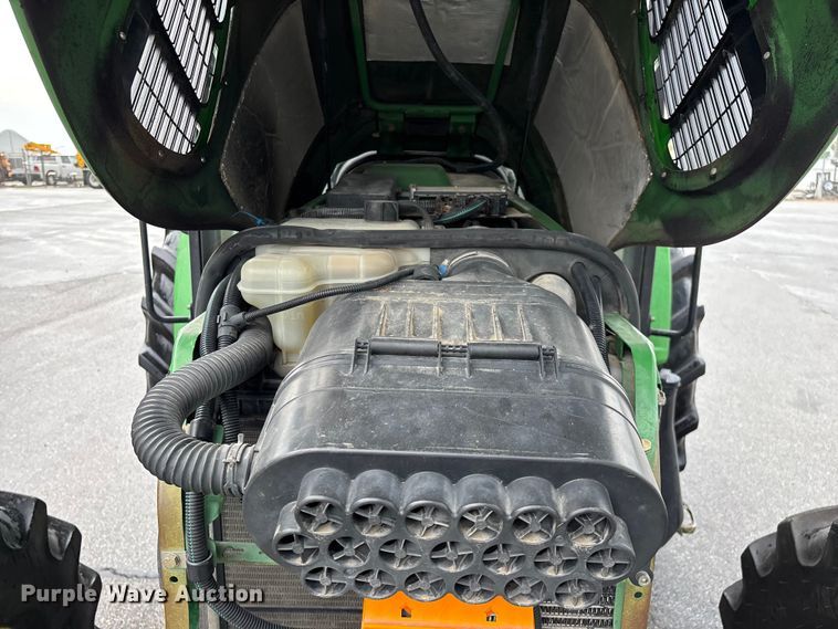image for item FG0580 2009 John Deere 6330 MFWD tractor