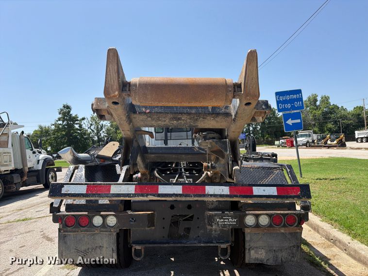 image for item FI0298 2025 Western Star 47X Chassis roll-off container truck