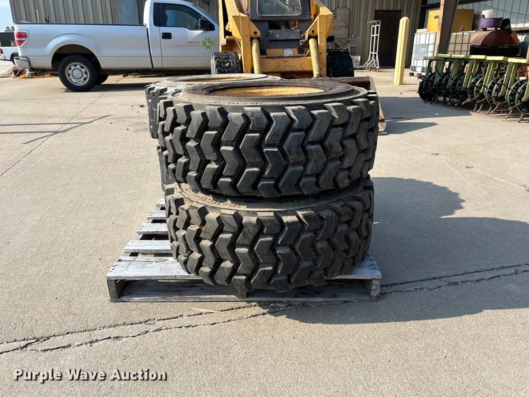 image for item NM9922 (4) 12-16.5 tires and wheels