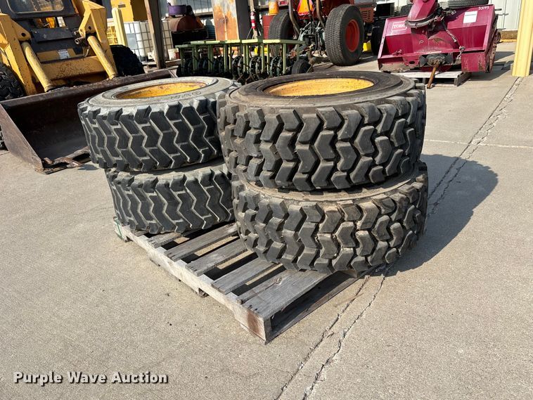 image for item NM9922 (4) 12-16.5 tires and wheels