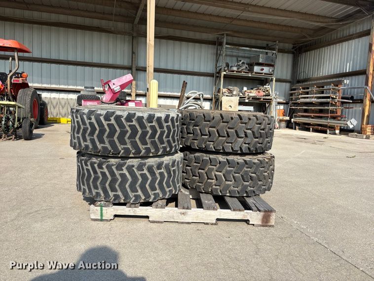 image for item NM9922 (4) 12-16.5 tires and wheels